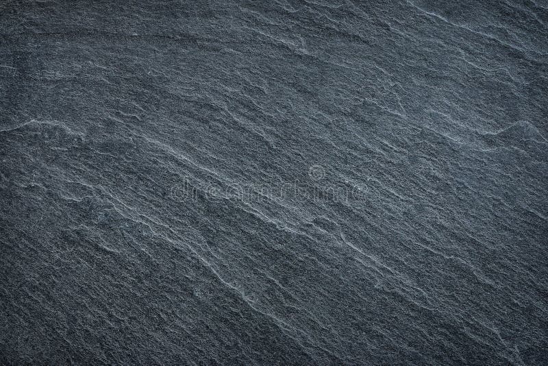 The Dark grey black slate background or texture. The Dark grey black slate background or texture.