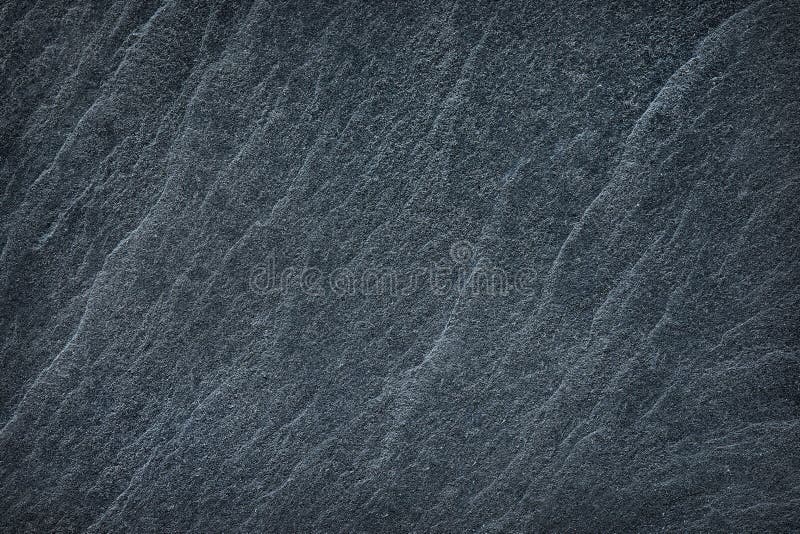 The Dark grey black slate background or texture. The Dark grey black slate background or texture.