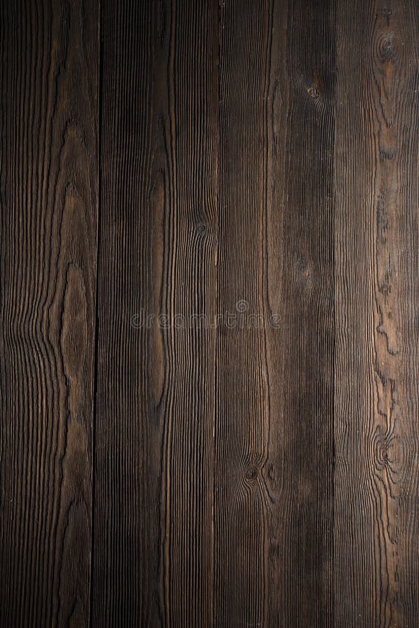 Mörk wood bakgrundsbruntfärg royaltyfri foto