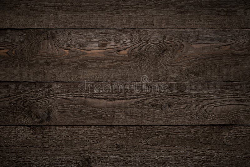 Mörkt brun, strimlad textur eller bakgrund royaltyfria bilder