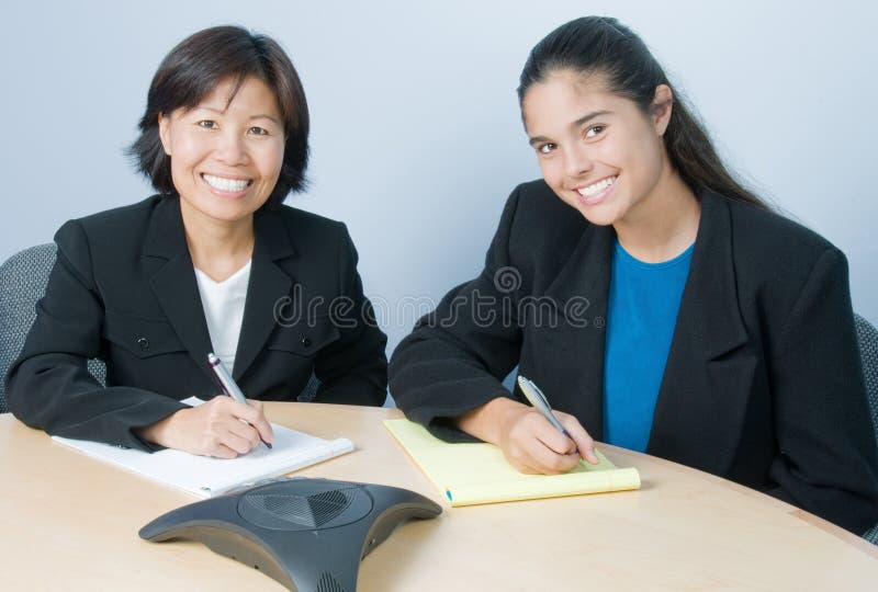 Beautiful, confident businesswomen enjoying a productive meeting. Beautiful, confident businesswomen enjoying a productive meeting