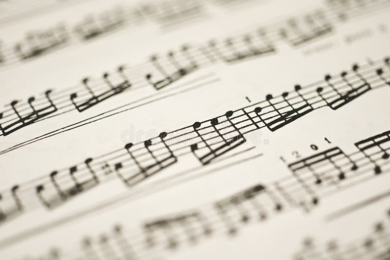 Música clássica - notas na folha do vintage imagens de stock Música clássica - notas na folha do vintage imagens de stock