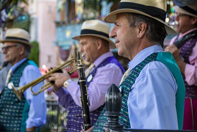 Members of the Dixieland Jazz Ensemble at the Magic Kingdom in Anaheim performing during the Holiday season.

Throughout the nineteenth century, diverse ethnic and racial groups — French, Spanish, and African, Italian, German, and Irish — found common cause in their love of music. The 1870s represented the culmination of a century of music making in the Crescent City. During this time, the European classical legacy and the influence of European folk and African/Caribbean elements were merged with a popular American mainstream, which combined and adapted Old World practices into new forms deriving from a distinctive regional environment. Just after the beginning of the new century, jazz began to emerge as part of a broad musical revolution encompassing ragtime, blues, spirituals, marches, and the popular fare of `Tin Pan Alley.` It also reflected the profound contributions of people of African heritage to this new and distinctly American music.n. Members of the Dixieland Jazz Ensemble at the Magic Kingdom in Anaheim performing during the Holiday season.

Throughout the nineteenth century, diverse ethnic and racial groups — French, Spanish, and African, Italian, German, and Irish — found common cause in their love of music. The 1870s represented the culmination of a century of music making in the Crescent City. During this time, the European classical legacy and the influence of European folk and African/Caribbean elements were merged with a popular American mainstream, which combined and adapted Old World practices into new forms deriving from a distinctive regional environment. Just after the beginning of the new century, jazz began to emerge as part of a broad musical revolution encompassing ragtime, blues, spirituals, marches, and the popular fare of `Tin Pan Alley.` It also reflected the profound contributions of people of African heritage to this new and distinctly American music.n