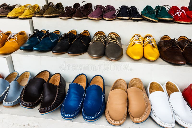 CLASSIC MAN SHOES COLORFUL IN A ROW. CLASSIC MAN SHOES COLORFUL IN A ROW