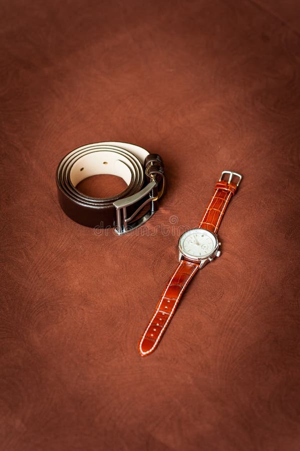 Mężczyzna pasek i wristwatches zdjęcia stock Mężczyzna pasek i wristwatches zdjęcia stock