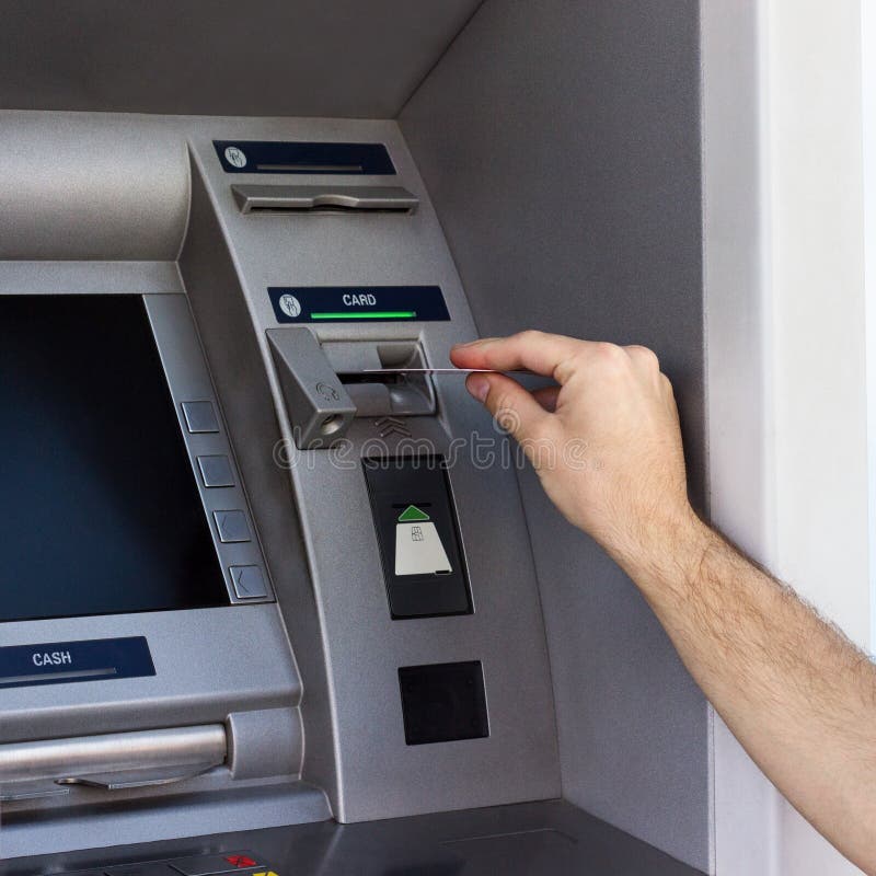 Mężczyzna ręka używać ATM zdjęcia stock Mężczyzna ręka używać ATM zdjęcia stock