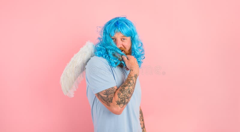 man with beard and peruke acts like an agel with wings. man with beard and peruke acts like an agel with wings