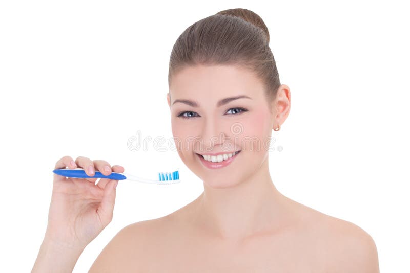 Młoda piękna uśmiechnięta kobieta z toothbrush odizolowywającym na bielu obraz royalty free Młoda piękna uśmiechnięta kobieta z toothbrush odizolowywającym na bielu obraz royalty free