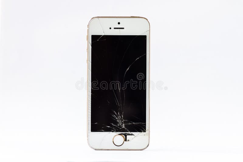 Młot i smartphone z łamanym ekranem zdjęcie royalty free Młot i smartphone z łamanym ekranem zdjęcie royalty free