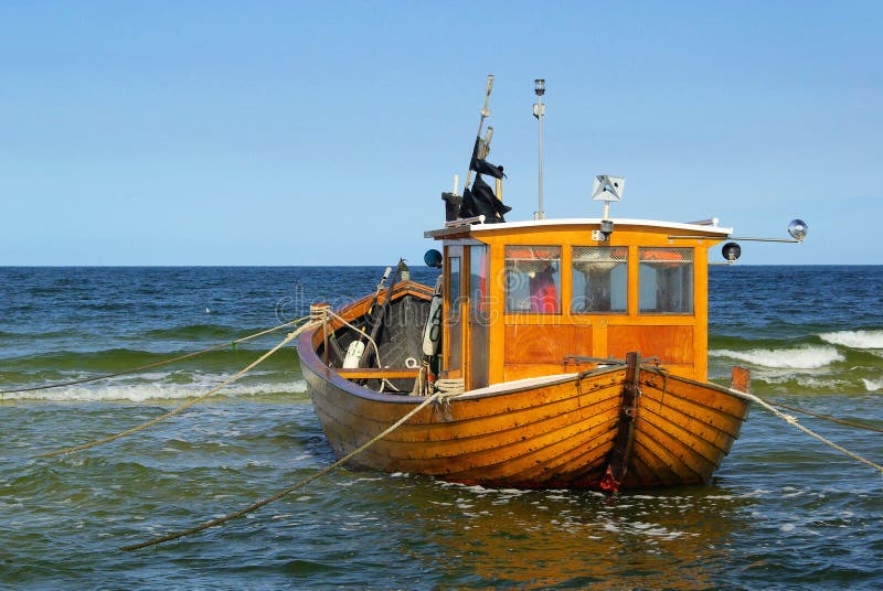 Old fishing cutter on the beach, Baltic Sea. Old fishing cutter on the beach, Baltic Sea