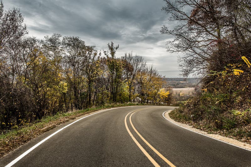 Curved road in rural Iowa in the fall. Curved road in rural Iowa in the fall