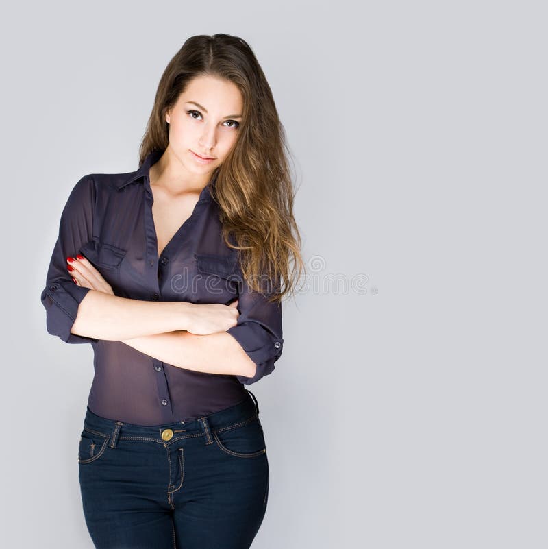 Nachdenkliche junge Brunettefrau. stockfotos
