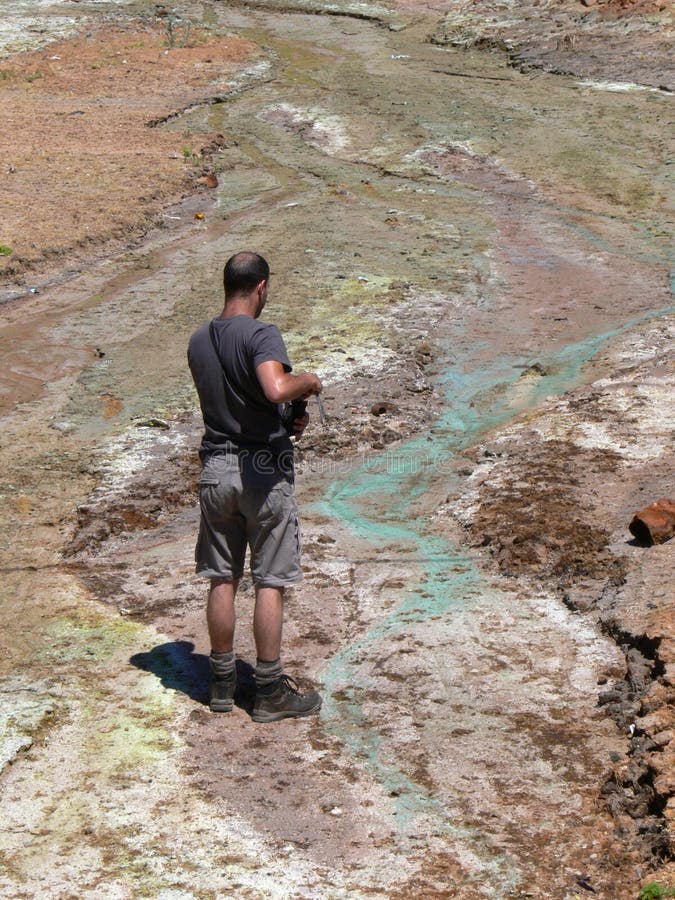 Image of a scientist investigating pollution. Image of a scientist investigating pollution