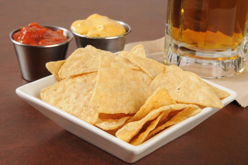 Bar food, nachos and beer stock image. Image of cheese 33441325
