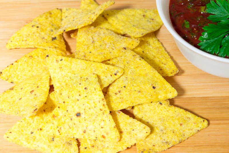 Nachos Corn Chips with Classic Tomato Salsa. Fresh Cold Beer is Perfect