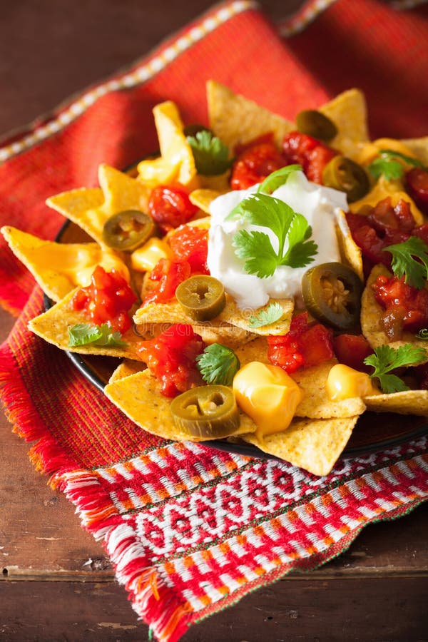Nachos Loaded with Salsa, Cheese and Jalapeno Stock Photo Image of
