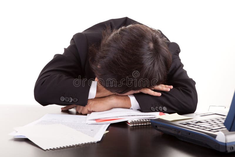 Nad dosypianiem biurko biznesowy mężczyzna fotografia stock