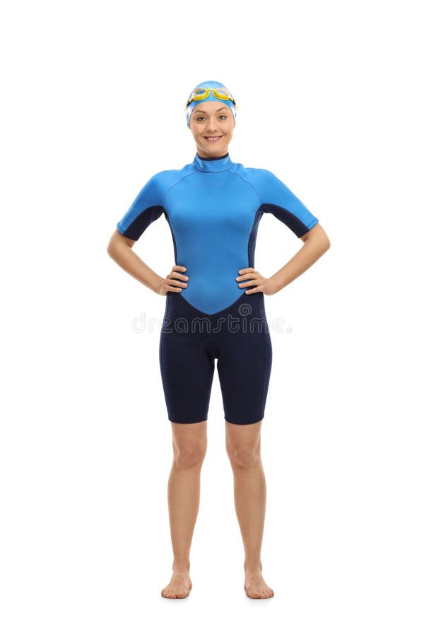 Nadador de sexo femenino que mira la cámara y la sonrisa imagen de archivo libre de regalías Nadador de sexo femenino que mira la cámara y la sonrisa imagen de archivo libre de regalías