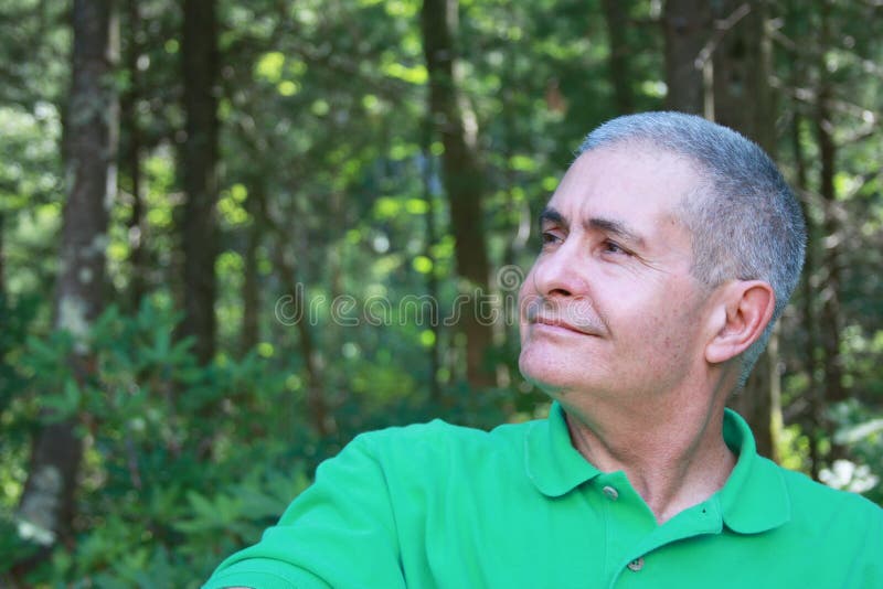 An elderly man is looking up the sky, healthy, happy, proud of his own life. An elderly man is looking up the sky, healthy, happy, proud of his own life.