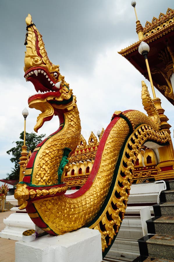 Naga statue at thai temple stock photo. Image of gold 19699310