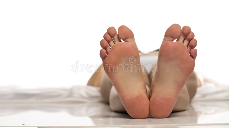 Bare female soles on a white background. Bare female soles on a white background