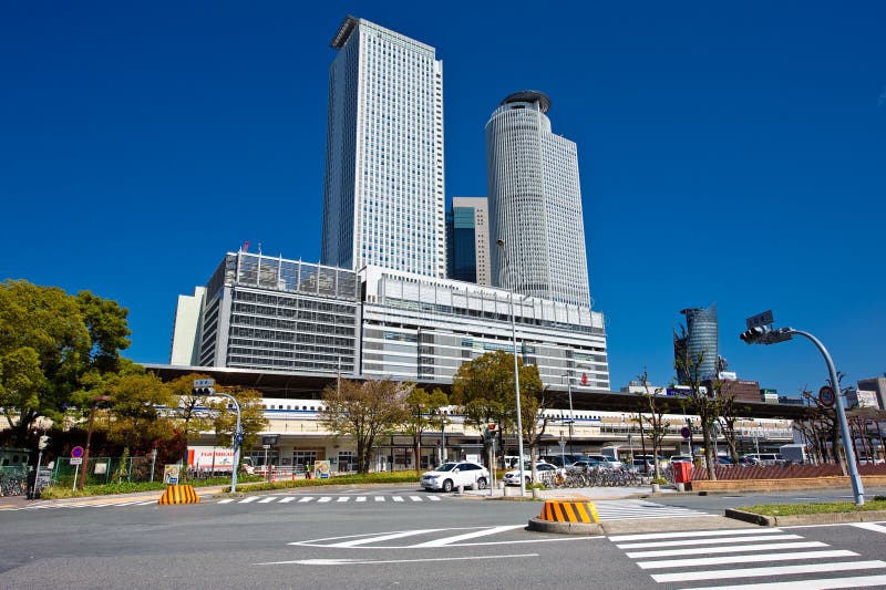 Shinkansen arrive at Nagoya Station. Nagoya Station is the world's largest train station by floor area (410, 000 mÂ², 2011) and houses the headquarters of the Central Japan Railway Company (JR Central) - source wikipedia.