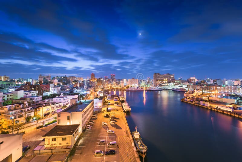 Naha, Okinawa, Japan Cityscape at Dawn. Naha, Okinawa, Japan downtown skyline at dawn from Tomari Port stock photography Naha, Okinawa, Japan Cityscape at Dawn. Naha, Okinawa, Japan downtown skyline at dawn from Tomari Port stock photography