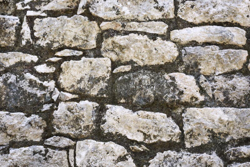 Nahaufnahme der alten Stein- Wandbeschaffenheit von Maya-Coba-Ruinen, Mexiko stockfotografie Nahaufnahme der alten Stein- Wandbeschaffenheit von Maya-Coba-Ruinen, Mexiko stockfotografie