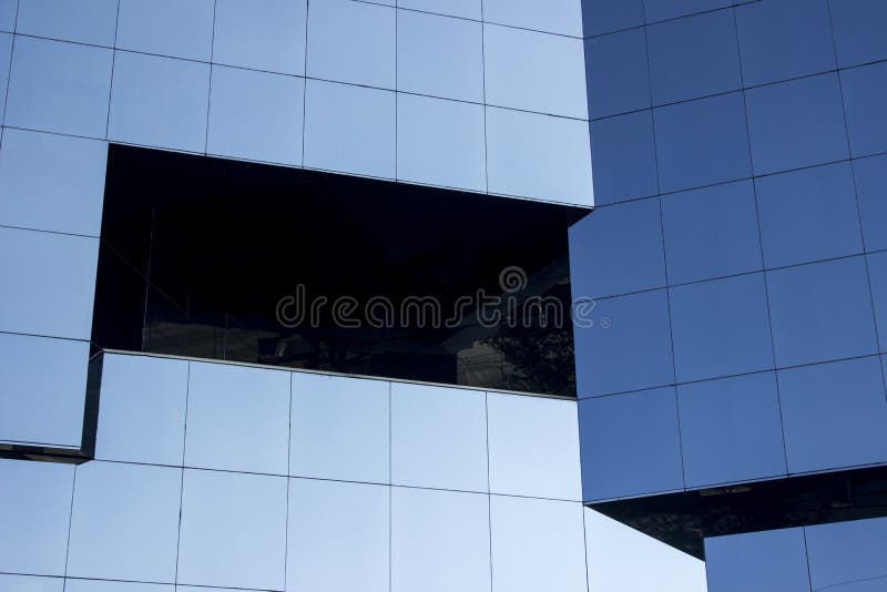 Nahaufnahme eines glatten modernen Glasfenster-Wand façade lizenzfreie stockbilder Nahaufnahme eines glatten modernen Glasfenster-Wand façade lizenzfreie stockbilder