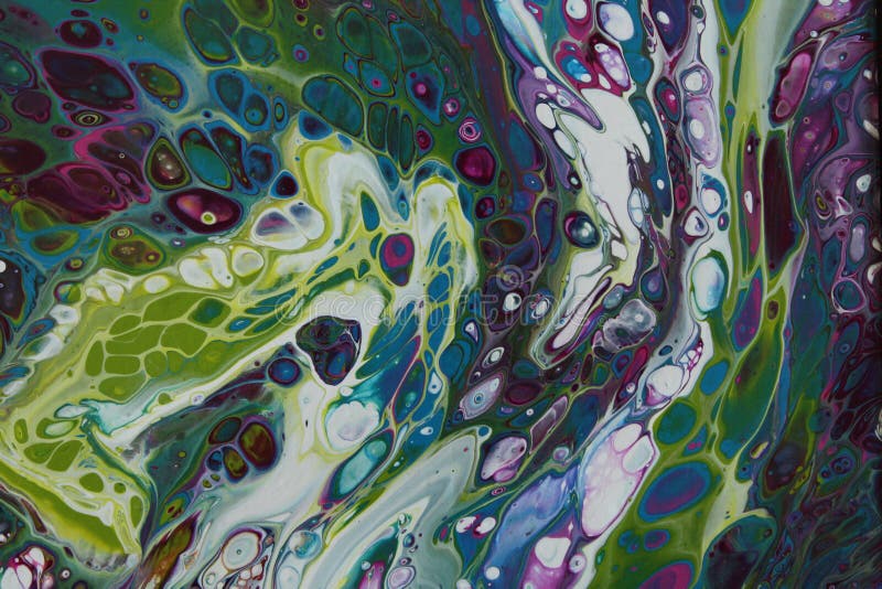 Closeup on a section of a flowing abstract acrylic pour painting with numerous cells of teal, green, blue, purple, and white popping through in a swirl pattern. Closeup on a section of a flowing abstract acrylic pour painting with numerous cells of teal, green, blue, purple, and white popping through in a swirl pattern.