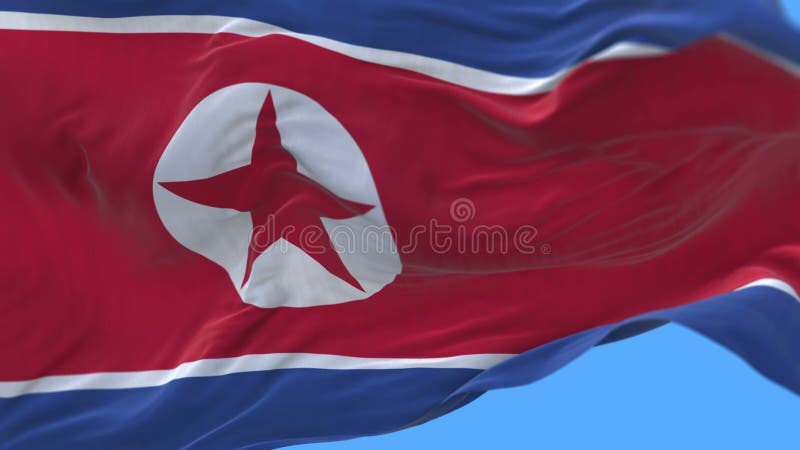 Nahtlose Abschluss 4k oben des langsamen Wellenartig bewegens Nordkorea-Flagge in windalpha Kanal.