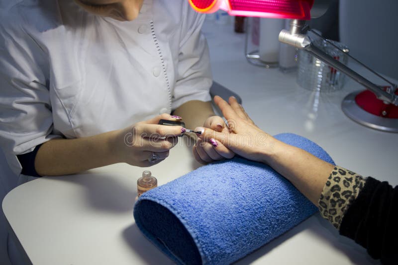 Nail care at beauty salon stock image. Image of beauty 18040529