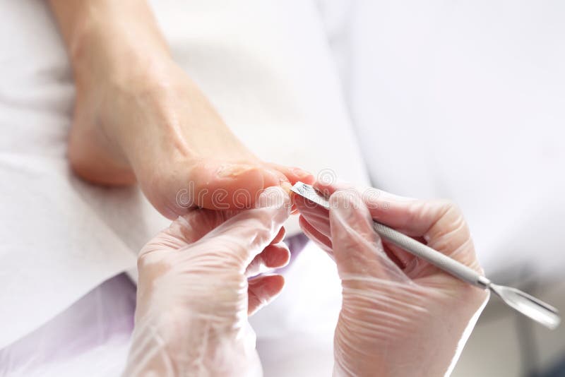Nail clipping at the feet. stock photo. Image of health 90935448
