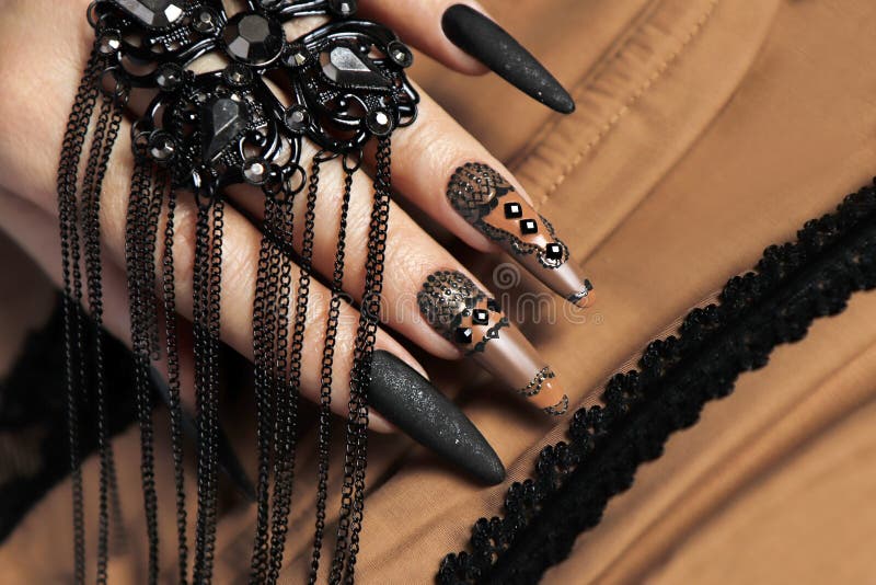 Nail Design with Black and Beige Nail Polish . Stock Photo Image of