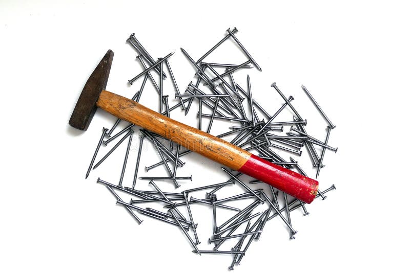 Nail and Hammer on a White Background Stock Image - Image of steel