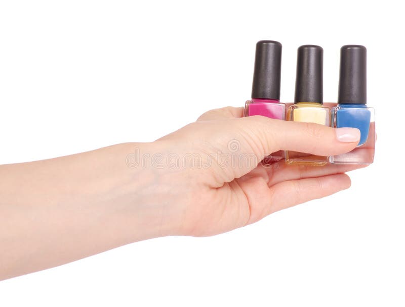 Nail polish in hand royalty free stock photo
