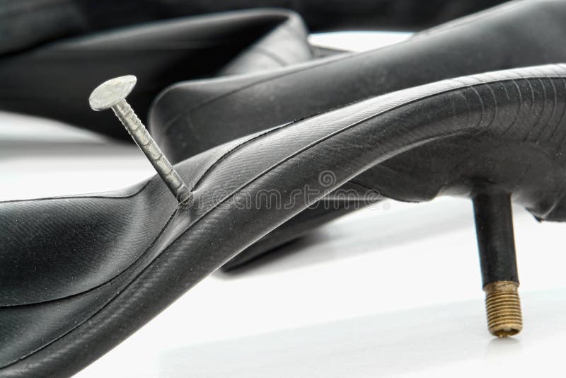 Nail in Punctured Flat Bicycle Tire Tube Stock Image Image of