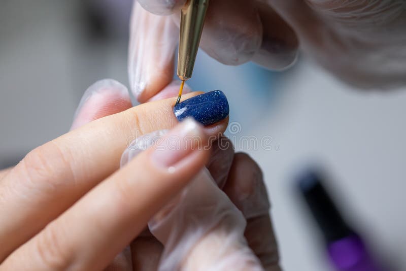 The Nail Service Master Makes a Manicure Corrects Unpainted Nails with