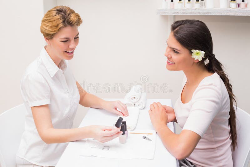 Nail Technician Giving Customer a Manicure Stock Image Image of