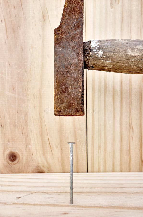 Nailing into Wood stock photo. Image of fastening, close 89409606