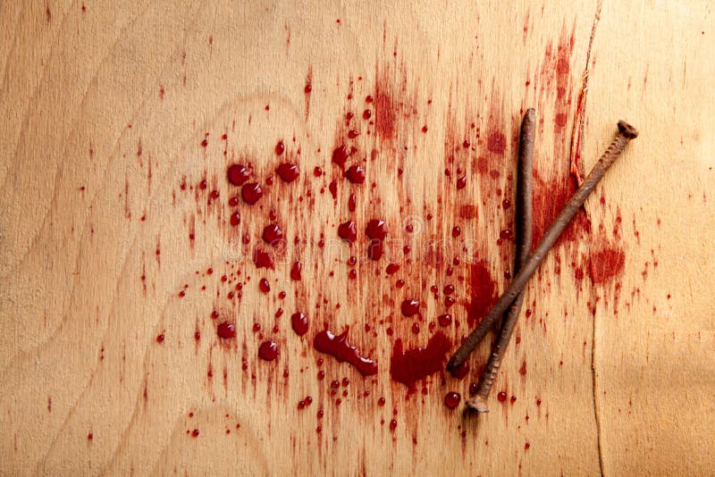 Nails with blood on wood desk royalty free stock image Nails with blood on wood desk royalty free stock image