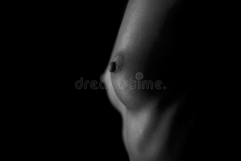 Black girl nude breast close up Naked Breast Of A Beautiful Girl On A Black Background Close Up Stock Photo Image Of Model Closeup 174453946