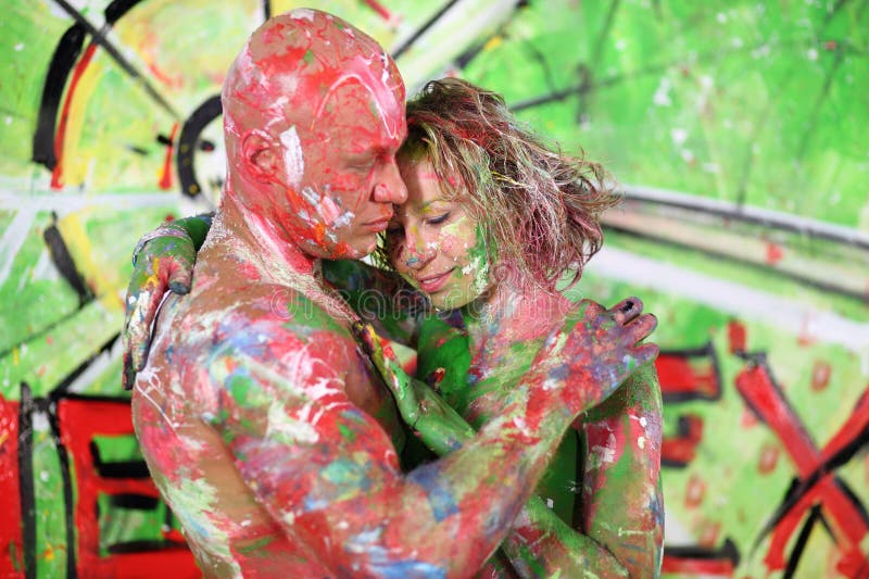 Naked Man and Women All in the Paint Hugging in Stock Photo - Image of bodyart, girl: 313637244