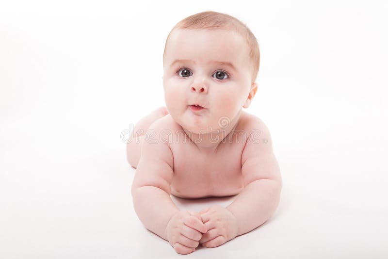 Newborn Naked Baby Child In White Diapers. Stock Photo 