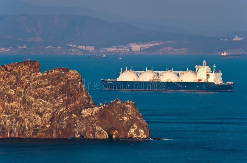 Nakhodka. Russia -April 05, 2016: LNG carrier Grand Elena at sunset on the roads of the port of Nakhodka.