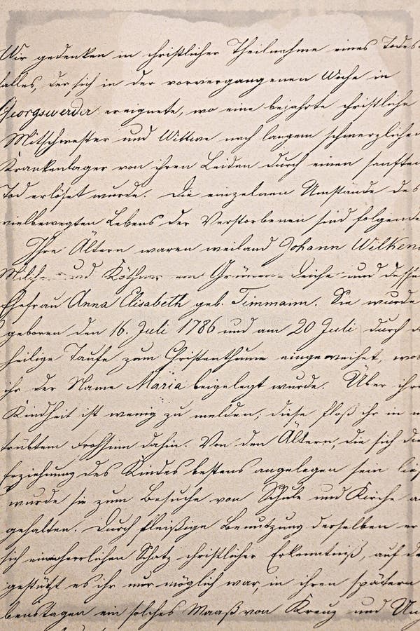 Damaged and distressed antique hand writing with a pen on sepia coloured paper with lovely cursive script in an old language which is approximately 250 years old for background. Damaged and distressed antique hand writing with a pen on sepia coloured paper with lovely cursive script in an old language which is approximately 250 years old for background