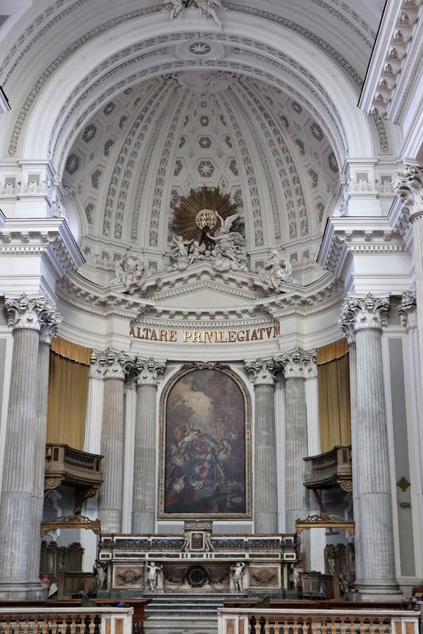 Naples, Campania, Italy - January 19, 2021: Interior of the eighteenth-century basilica dedicated to the Santissima Annunziata founded in the thirteenth century by the Angevins. Naples, Campania, Italy - January 19, 2021: Interior of the eighteenth-century basilica dedicated to the Santissima Annunziata founded in the thirteenth century by the Angevins