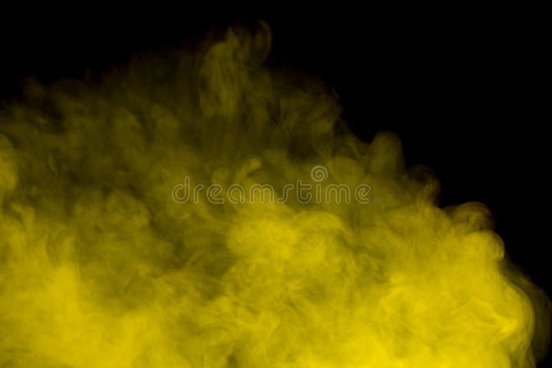 Abstract art. Yellow smoke hookah on a black background. Inhalation. The steam generator. The concept of poison gas. Abstract art. Yellow smoke hookah on a black background. Inhalation. The steam generator. The concept of poison gas.