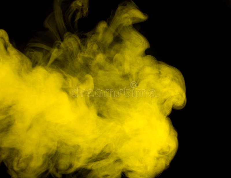 Abstract art. Yellow smoke hookah on a black background. Inhalation. The steam generator. The concept of poison gas. Abstract art. Yellow smoke hookah on a black background. Inhalation. The steam generator. The concept of poison gas.
