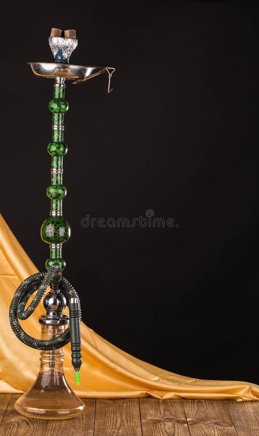 Exotic turkish hookah. Located on a white background. Exotic turkish hookah. Located on a white background.